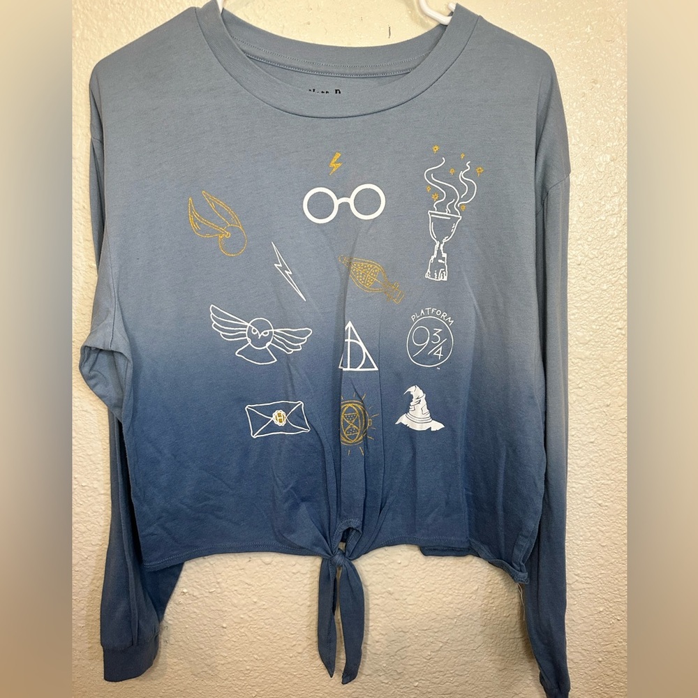 Blue Harry Potter, size juniors XL, kinda cropped, worn once, new condition.